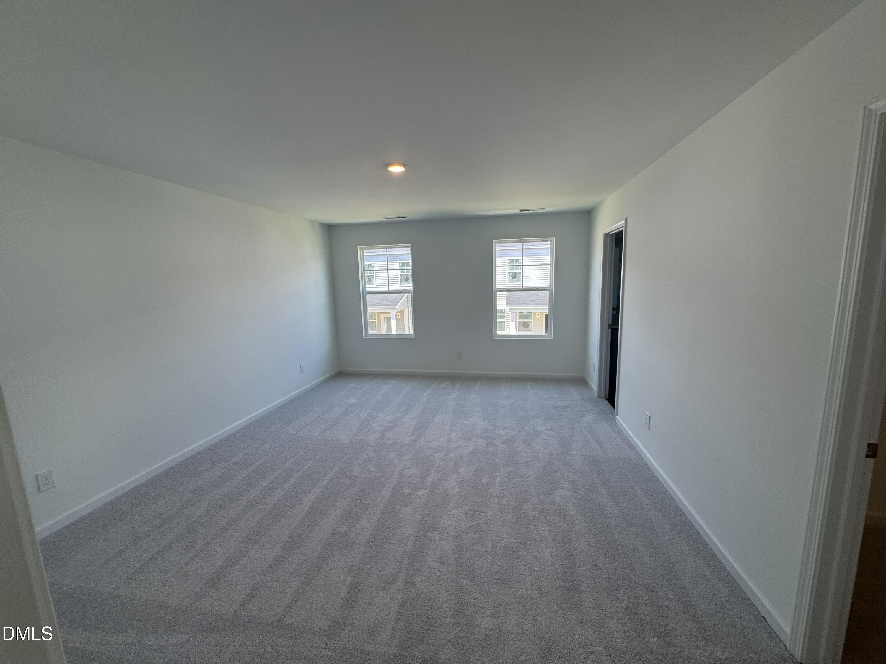 300 Thompson Overlook Way Smithfield, NC 27577 - Photo 5 of 41 an empty room with windows