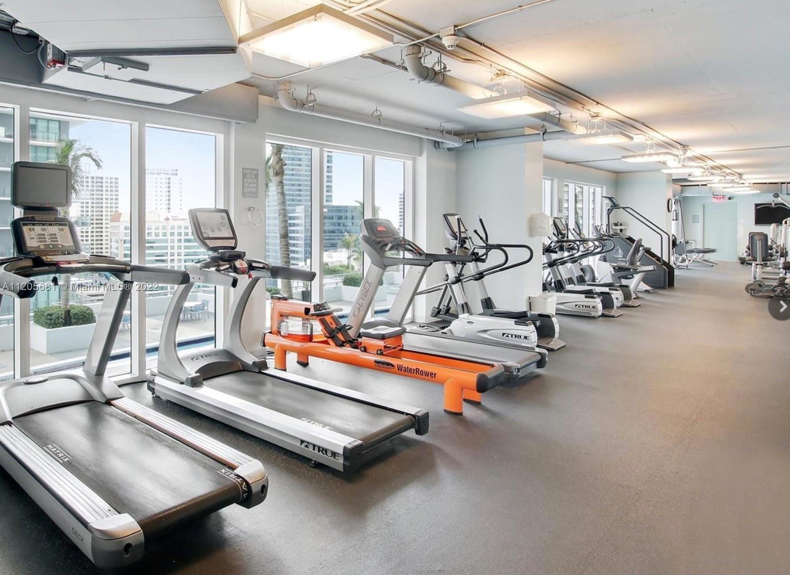 60 Southwest 13th Street, Unit 1412 Miami, FL 33130 - Photo 34 of 39 a view of a room with gym equipment