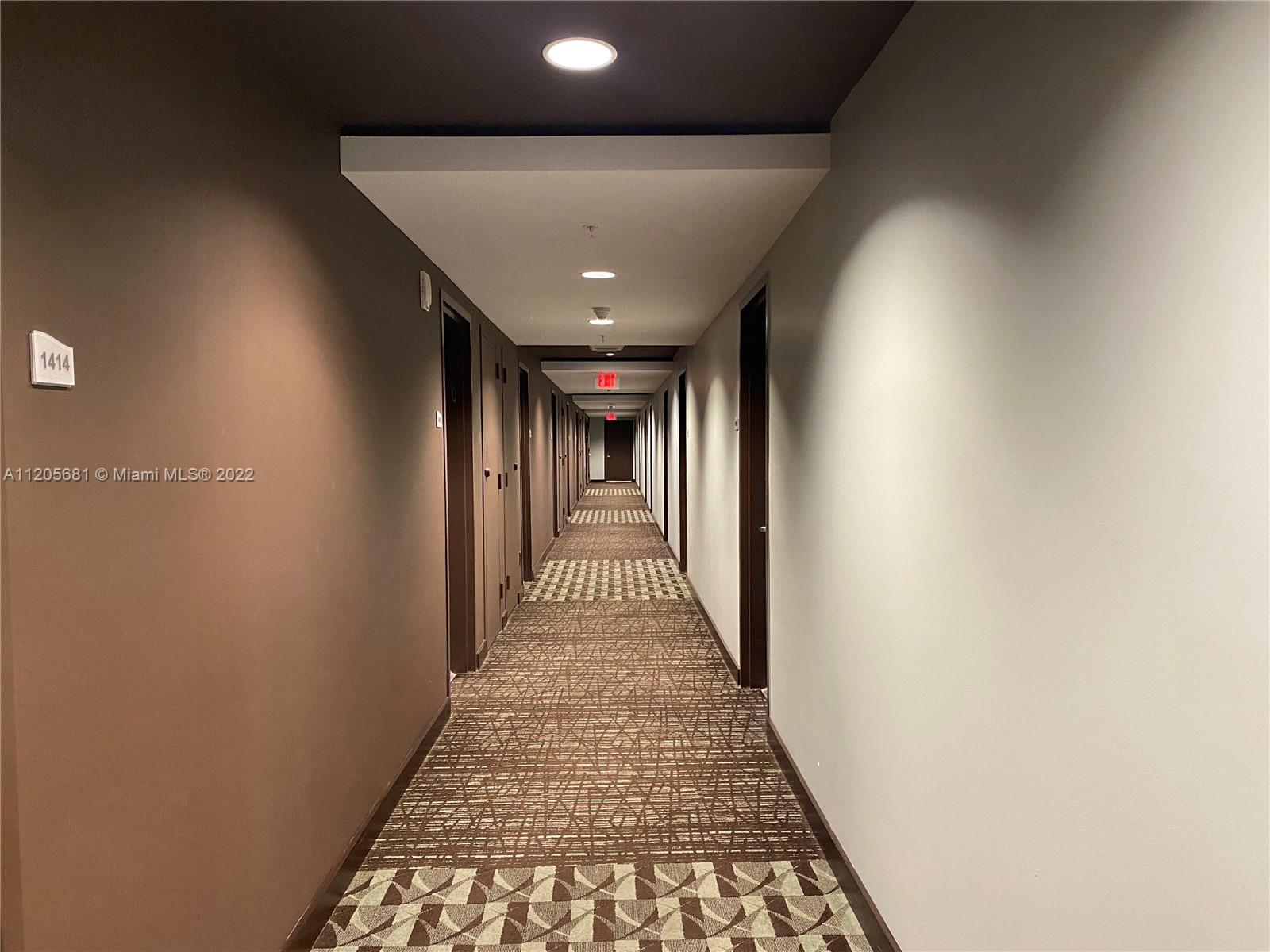 60 Southwest 13th Street, Unit 1412 Miami, FL 33130 - Photo 39 of 39 a view of gallery with wooden floor