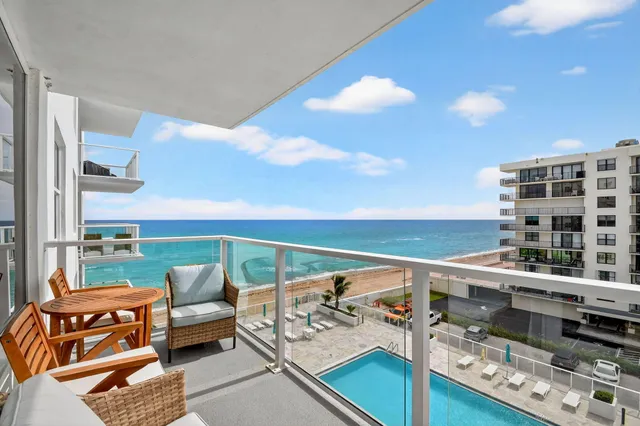 a bathroom with a double vanity sink toilet and a mirror