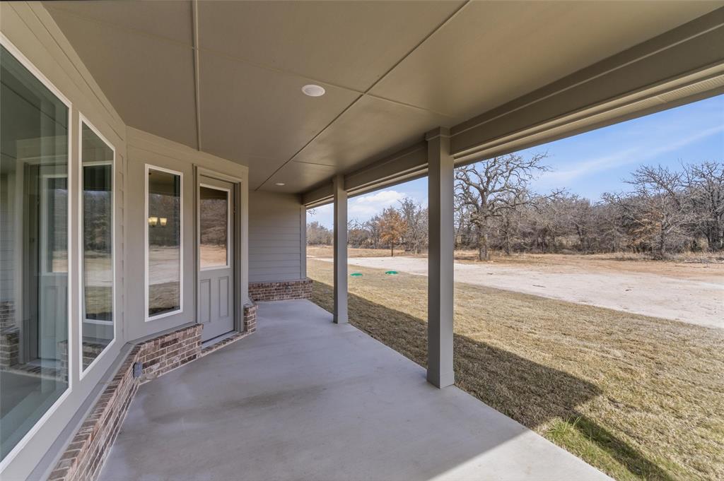 144 Oak Grv Way Springtown, TX 76082 - Photo 23 of 27 a view of a large mountain from a balcony