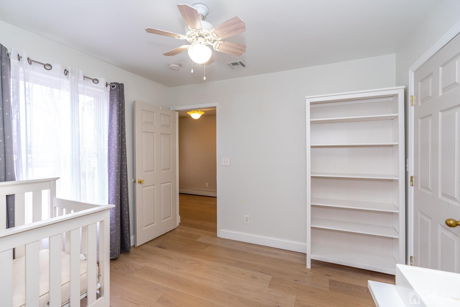 11 Baxter Road Edison, NJ 08817 - Photo 14 of 24 a view of an empty room with a window