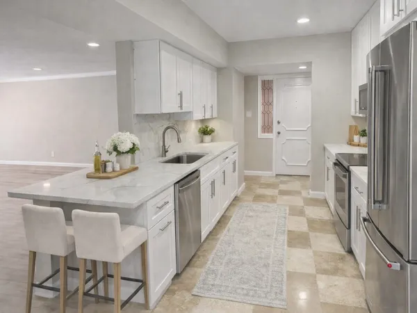 a kitchen with a sink and refrigerator