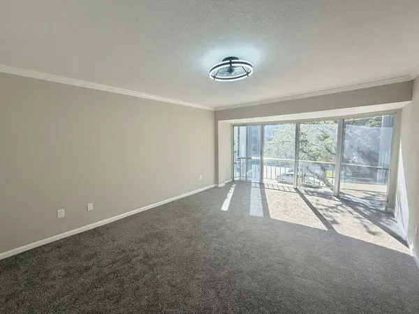 an empty room with a fireplace