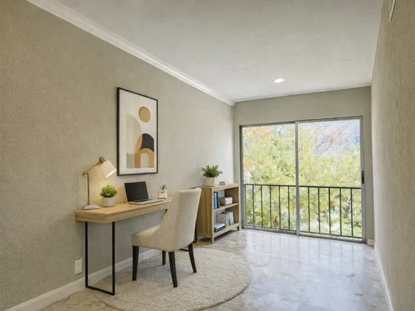 a spacious bedroom with a bed and a couch