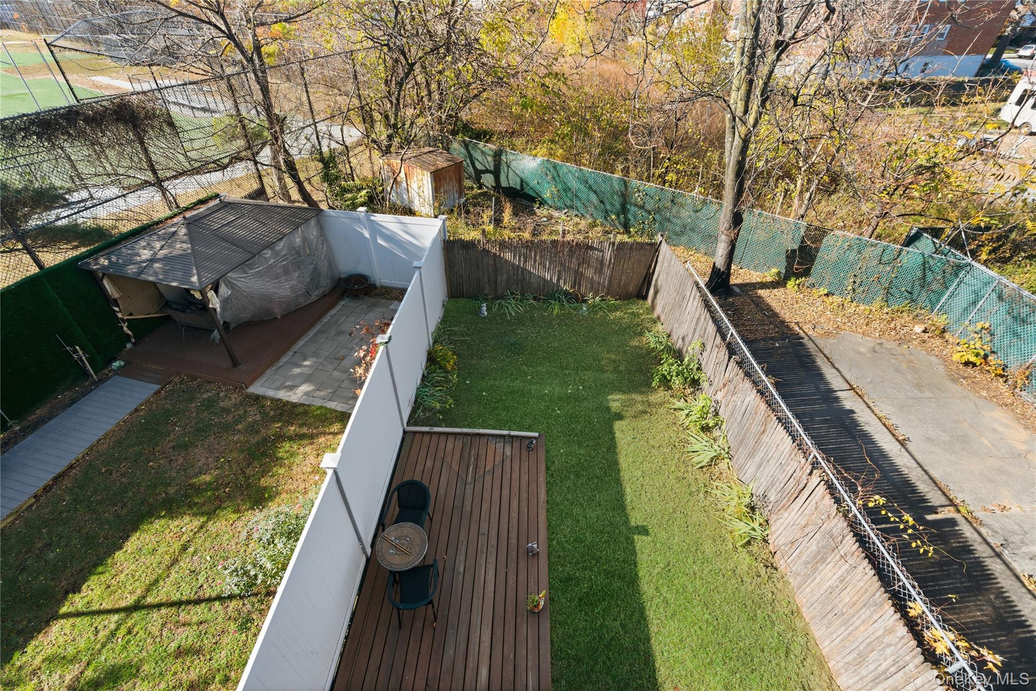 13716 88th Street Queens, NY 11417 - Photo 16 of 26 a view of a yard with furniture