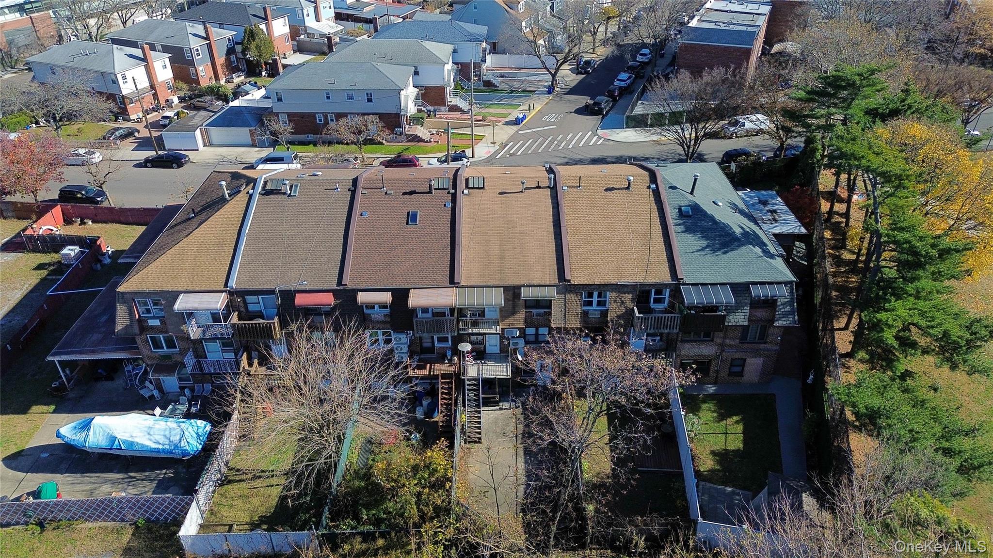 13716 88th Street Queens, NY 11417 - Photo 20 of 26 an aerial view of houses with outdoor space