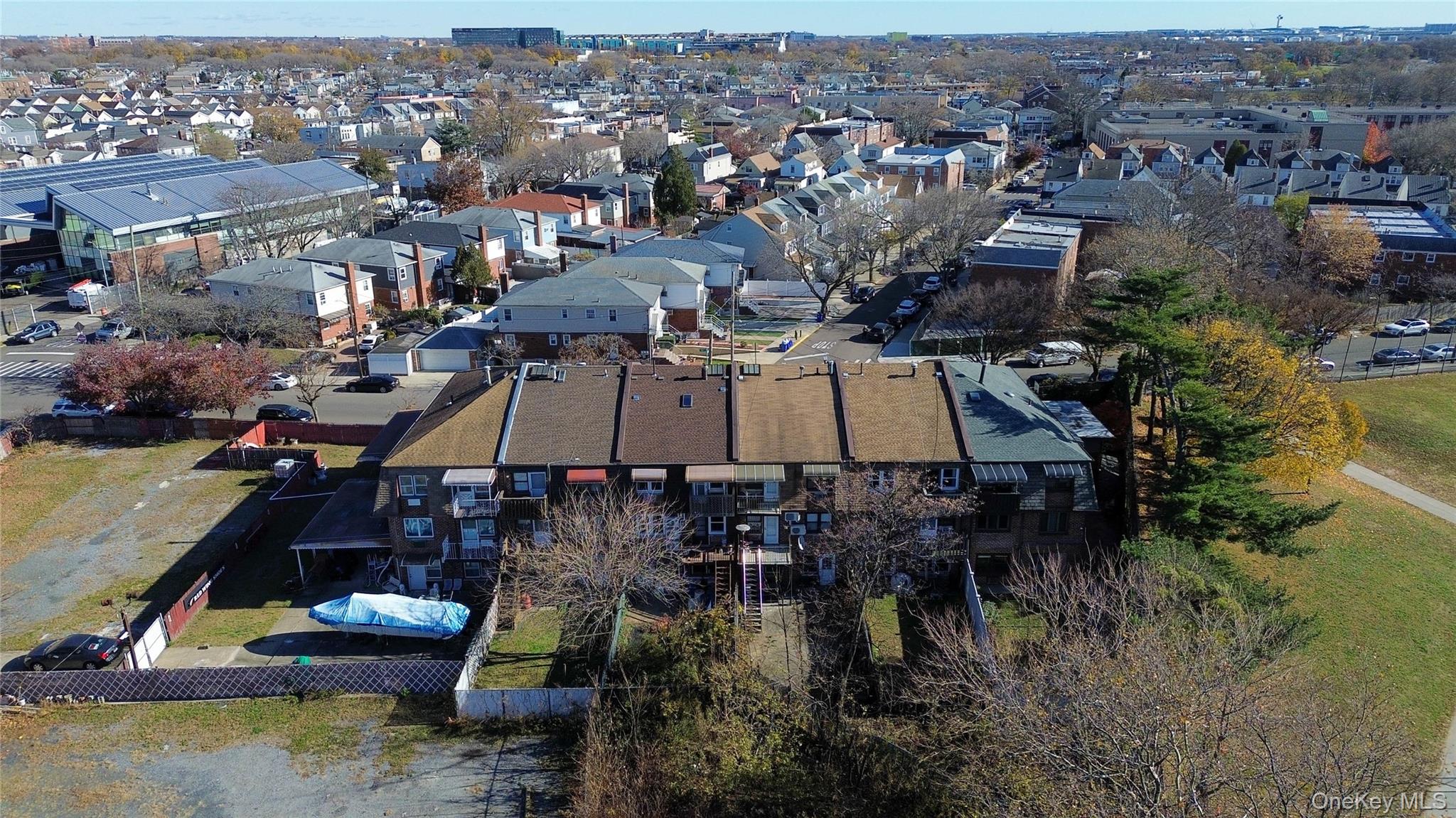 13716 88th Street Queens, NY 11417 - Photo 21 of 26 an aerial view of a houses with a swimming pool