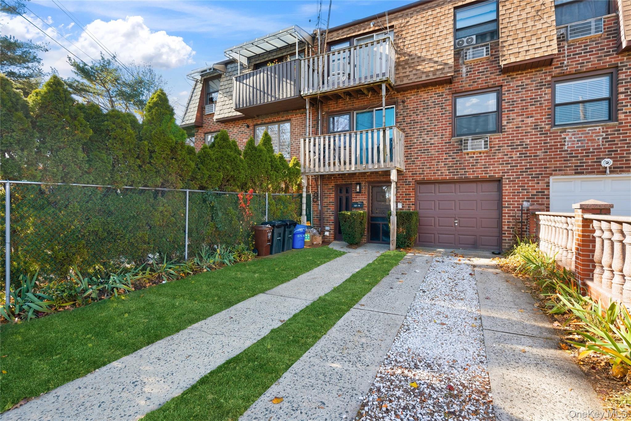 13716 88th Street Queens, NY 11417 - Photo 25 of 26 a view of a brick house with a yard and plants