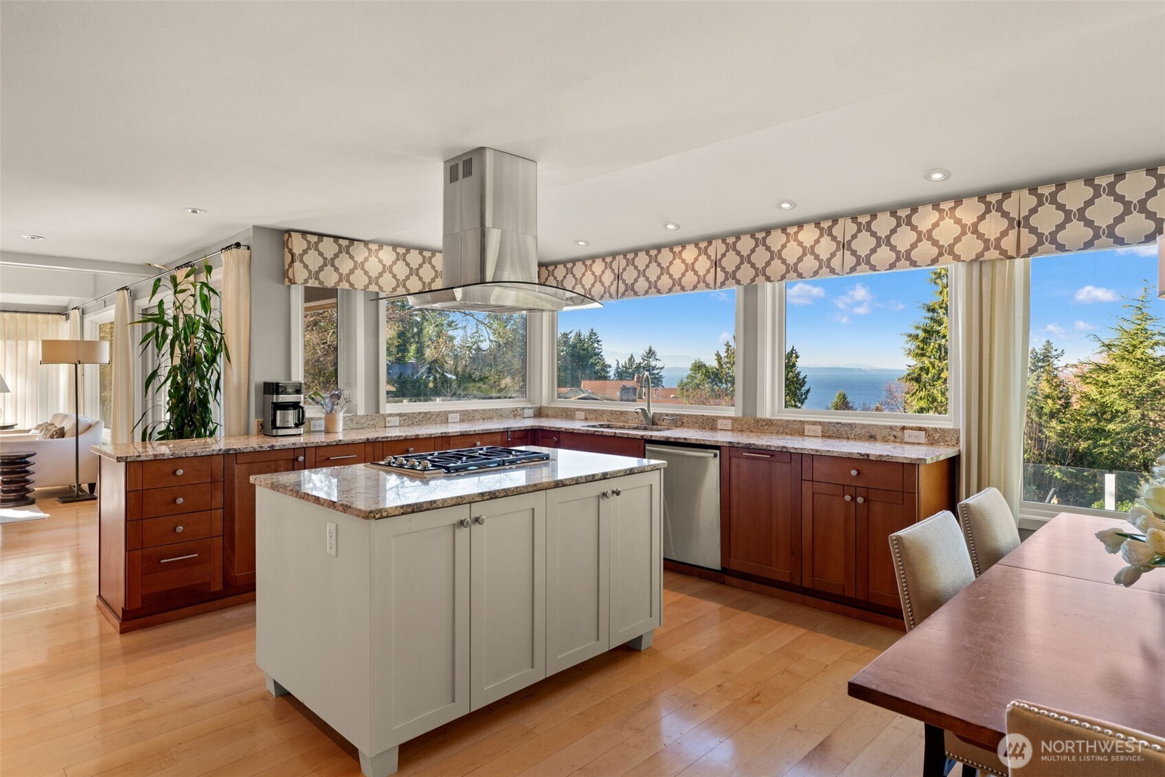 7819 175th Street Southwest Edmonds, WA 98026 - Photo 11 of 40 a kitchen with stainless steel appliances granite countertop a stove and a refrigerator