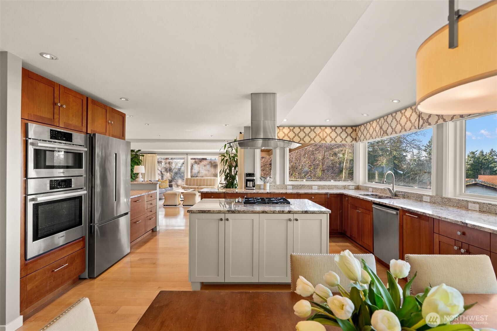 7819 175th Street Southwest Edmonds, WA 98026 - Photo 14 of 40 a kitchen with a sink stove and refrigerator