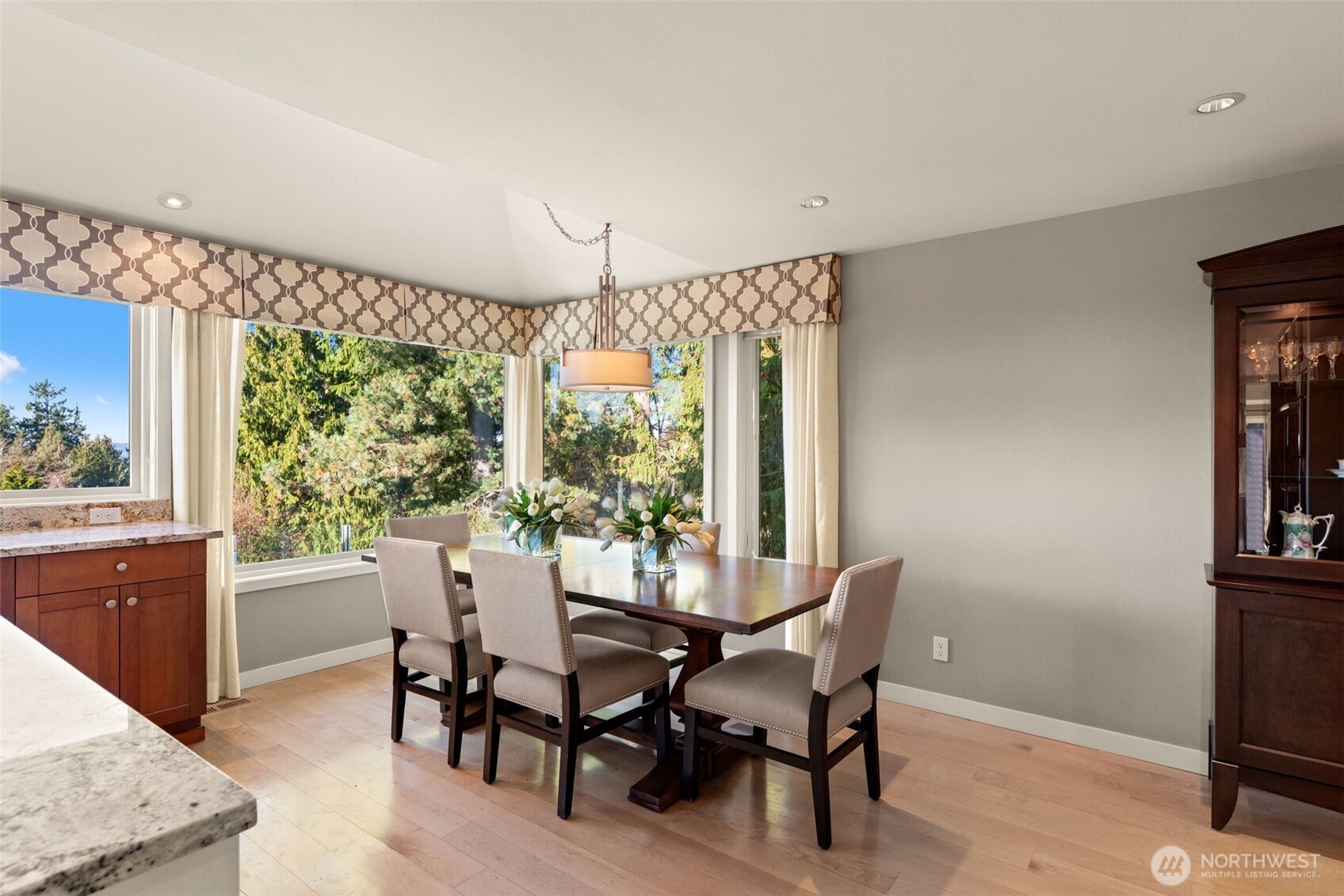 7819 175th Street Southwest Edmonds, WA 98026 - Photo 15 of 40 a view of a dining room with furniture window and outside view