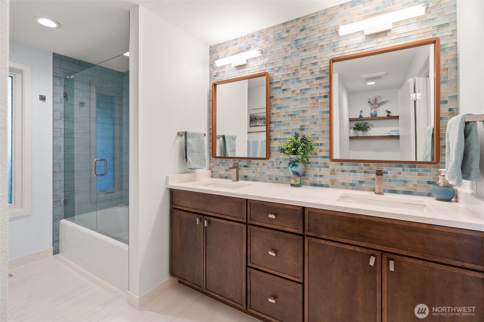 7819 175th Street Southwest Edmonds, WA 98026 - Photo 17 of 40 a bathroom with a tub sink and mirror