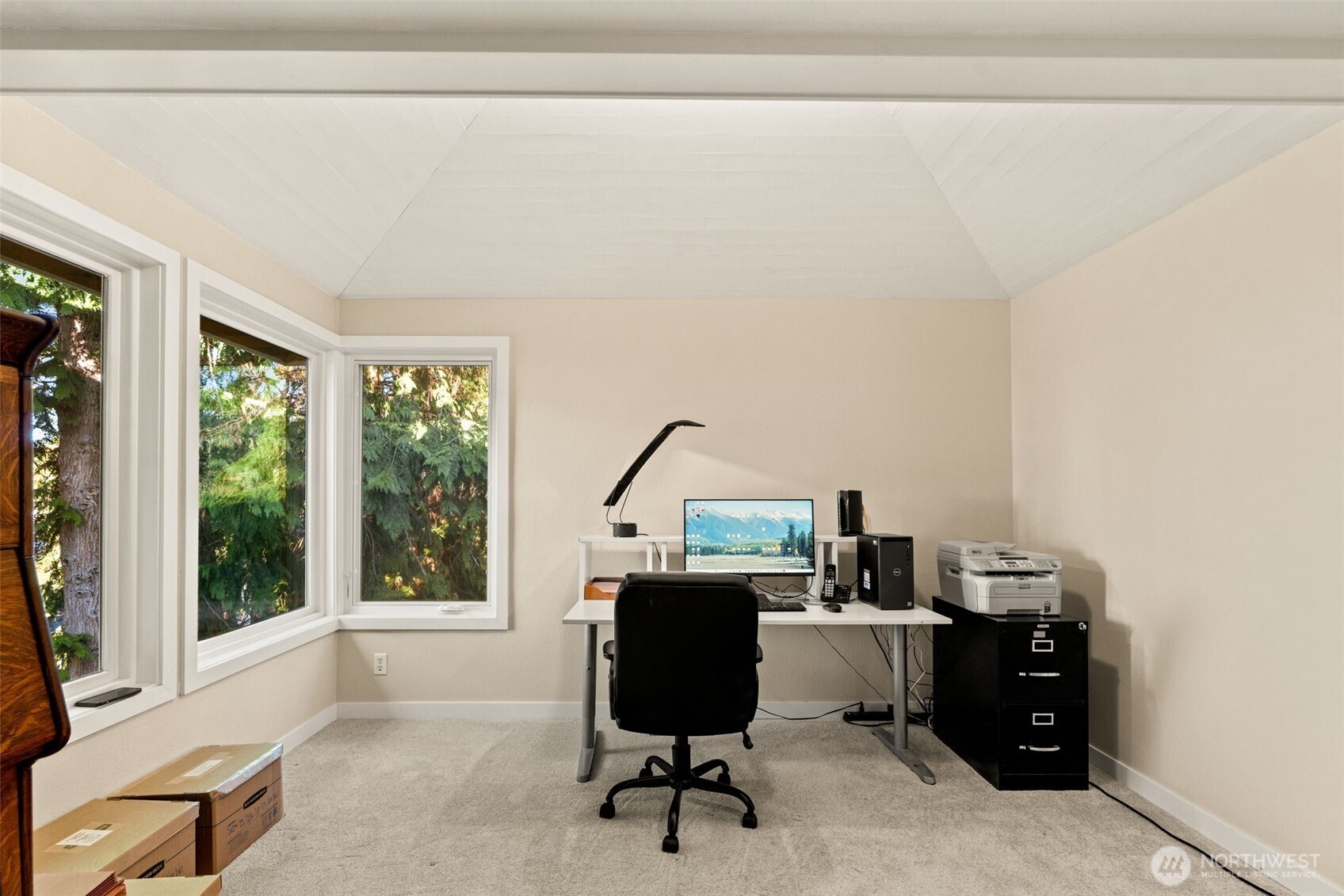 7819 175th Street Southwest Edmonds, WA 98026 - Photo 18 of 40 a view of a workspace with furniture and a window
