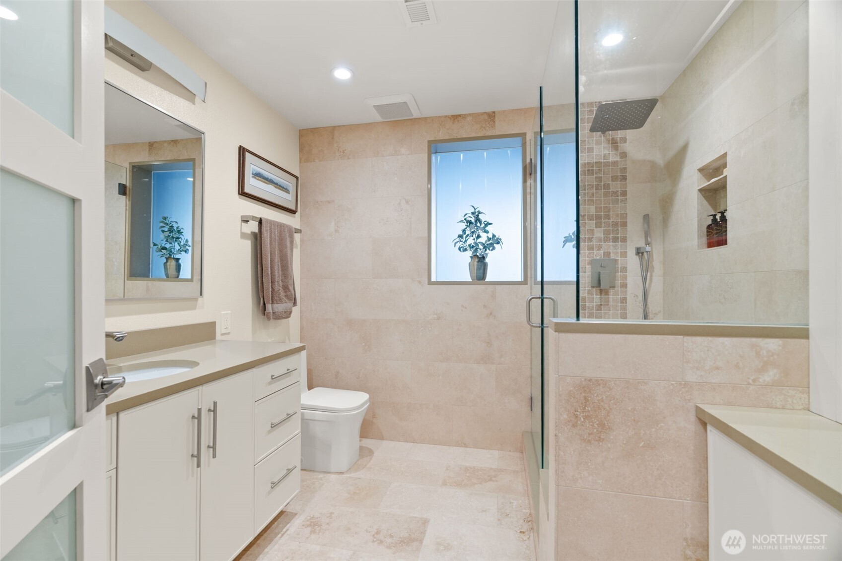 7819 175th Street Southwest Edmonds, WA 98026 - Photo 30 of 40 a bathroom with a toilet sink and mirror