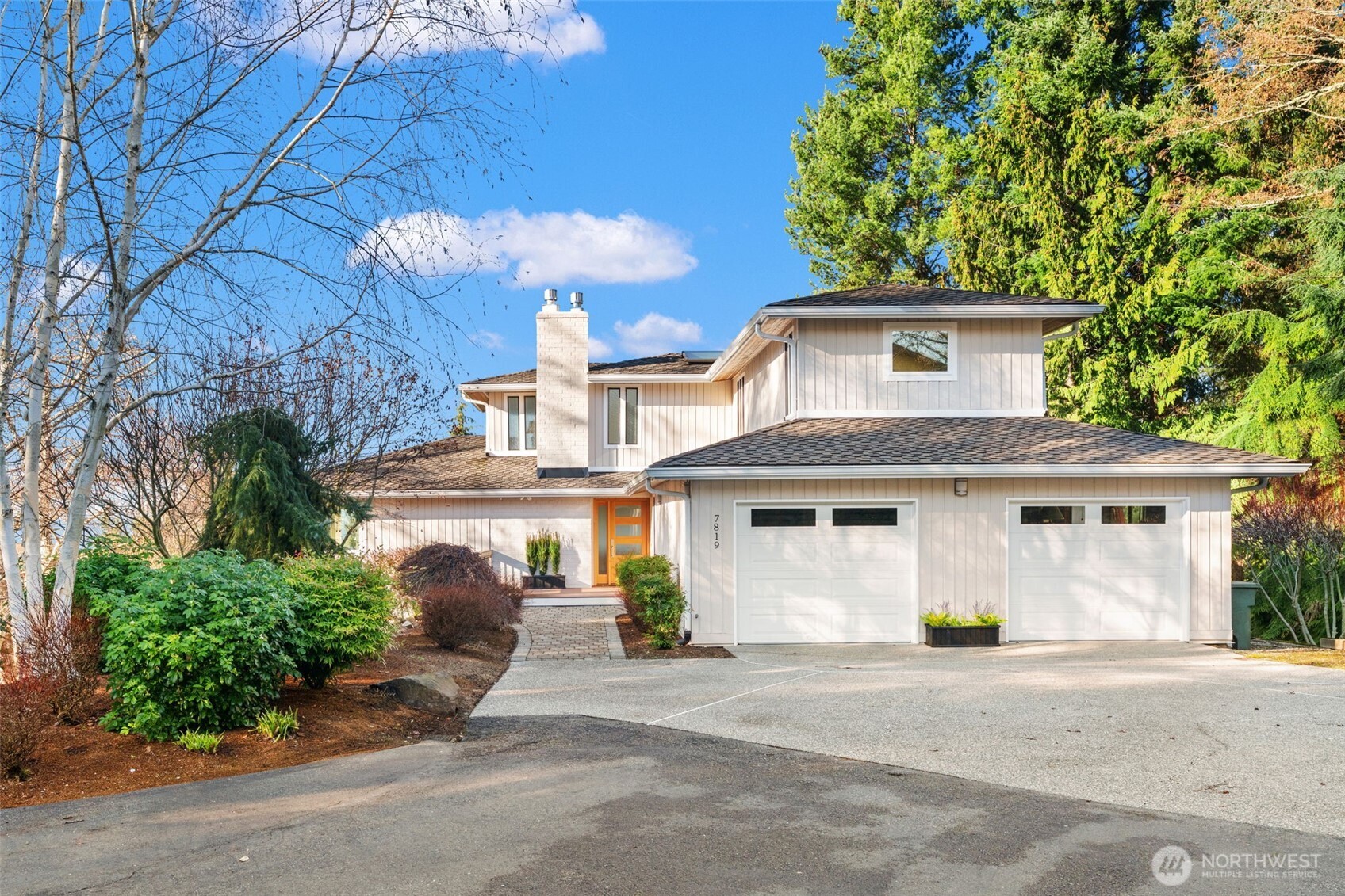 7819 175th Street Southwest Edmonds, WA 98026 - Photo 40 of 40 a front view of a house with a garden