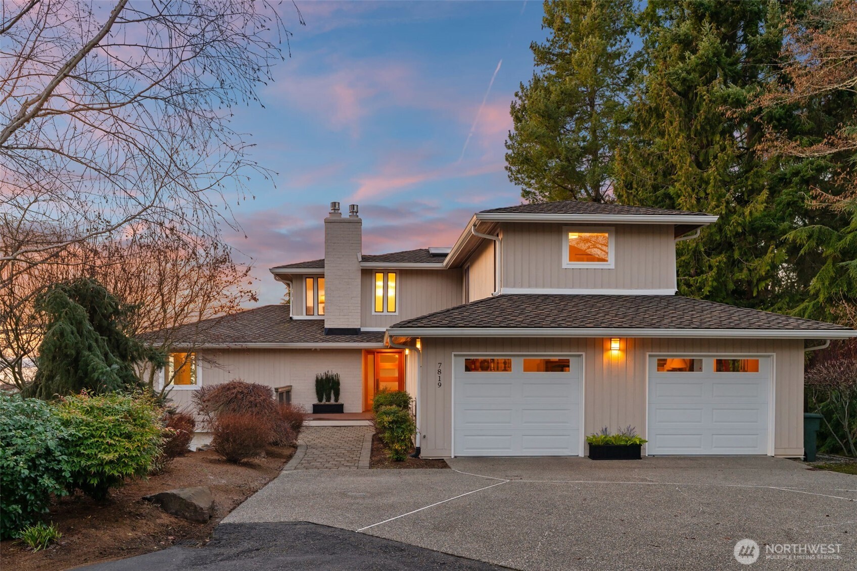 7819 175th Street Southwest Edmonds, WA 98026 - Photo 4 of 40 a front view of a house with yard and parking
