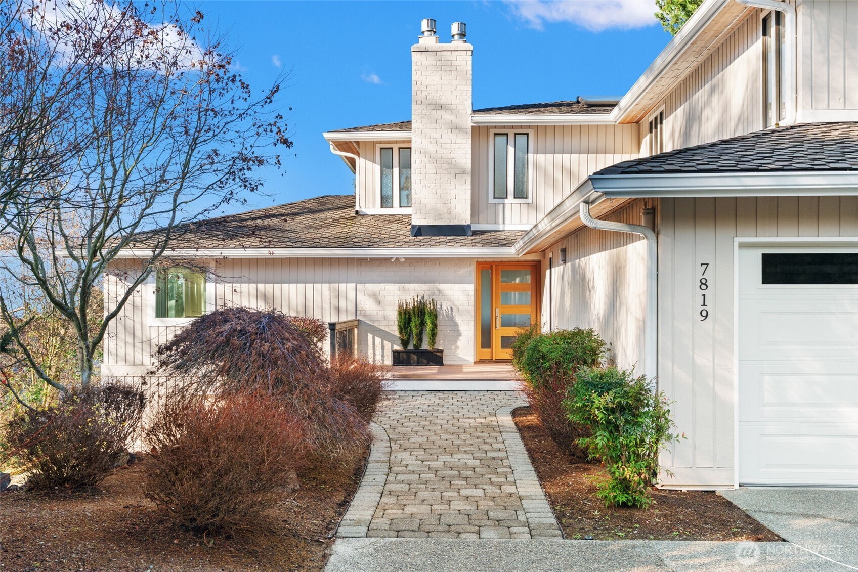 7819 175th Street Southwest Edmonds, WA 98026 - Photo 5 of 40 a front view of a house with garden
