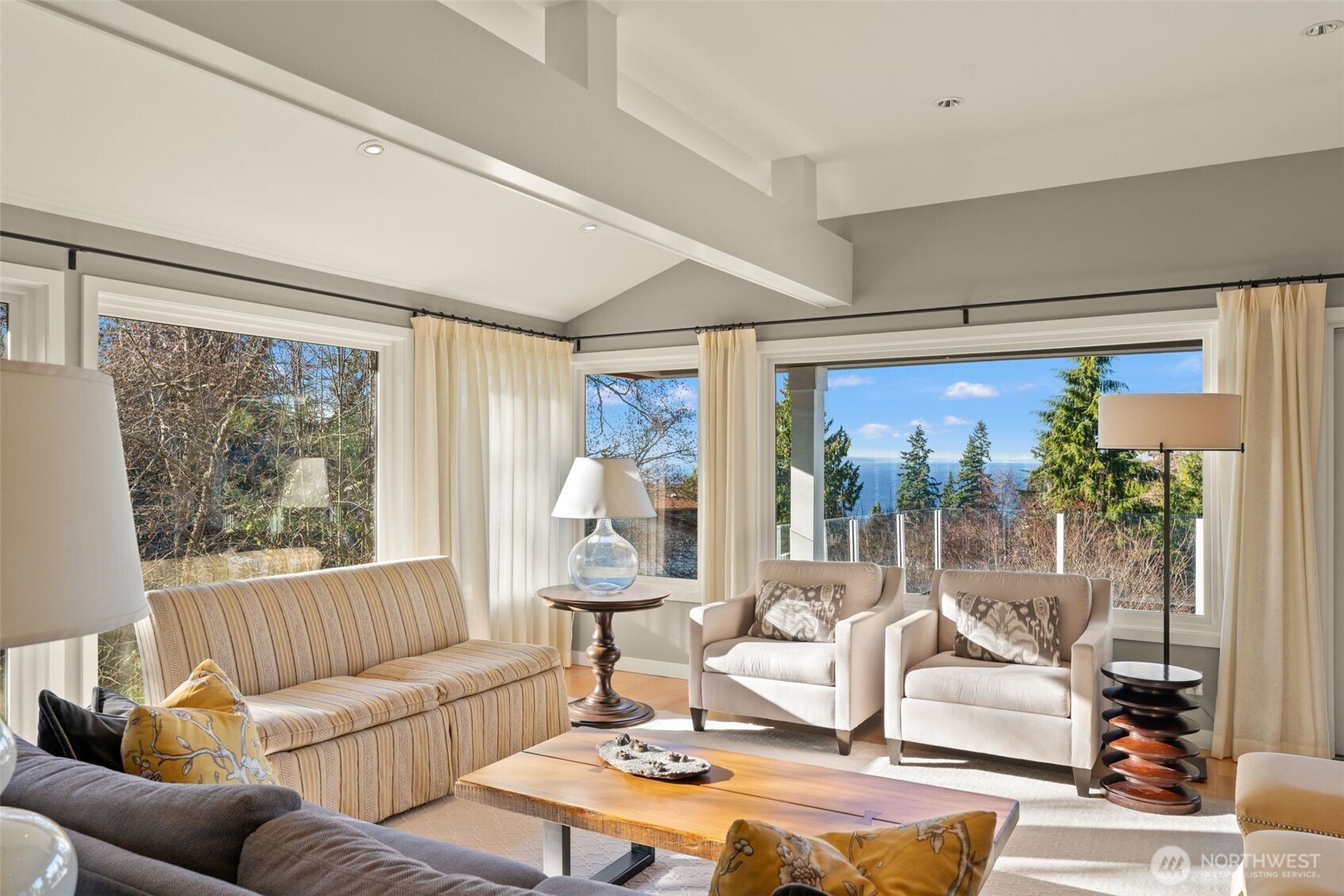 7819 175th Street Southwest Edmonds, WA 98026 - Photo 8 of 40 a living room with furniture and a large window
