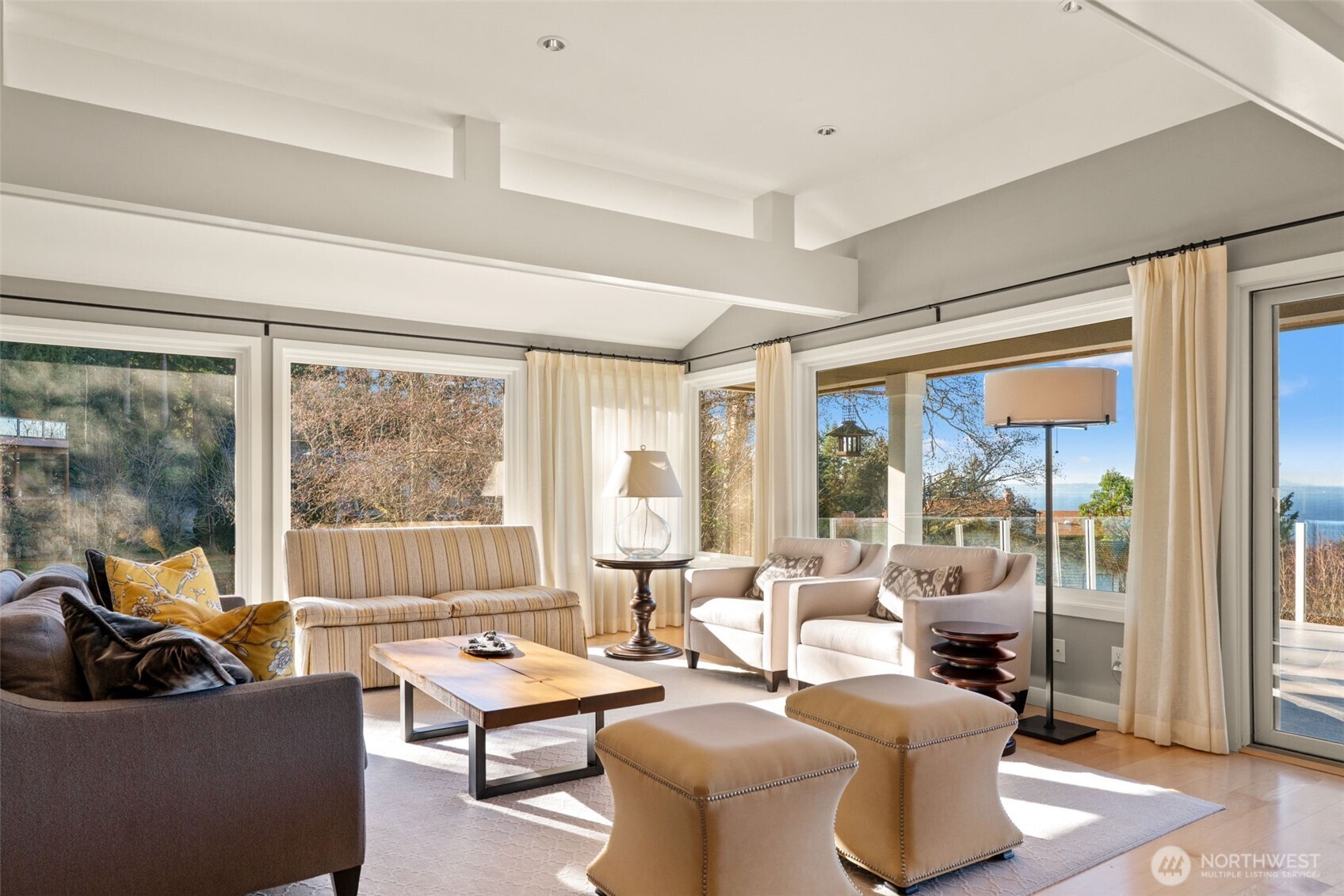 7819 175th Street Southwest Edmonds, WA 98026 - Photo 9 of 40 a living room with furniture and a large window
