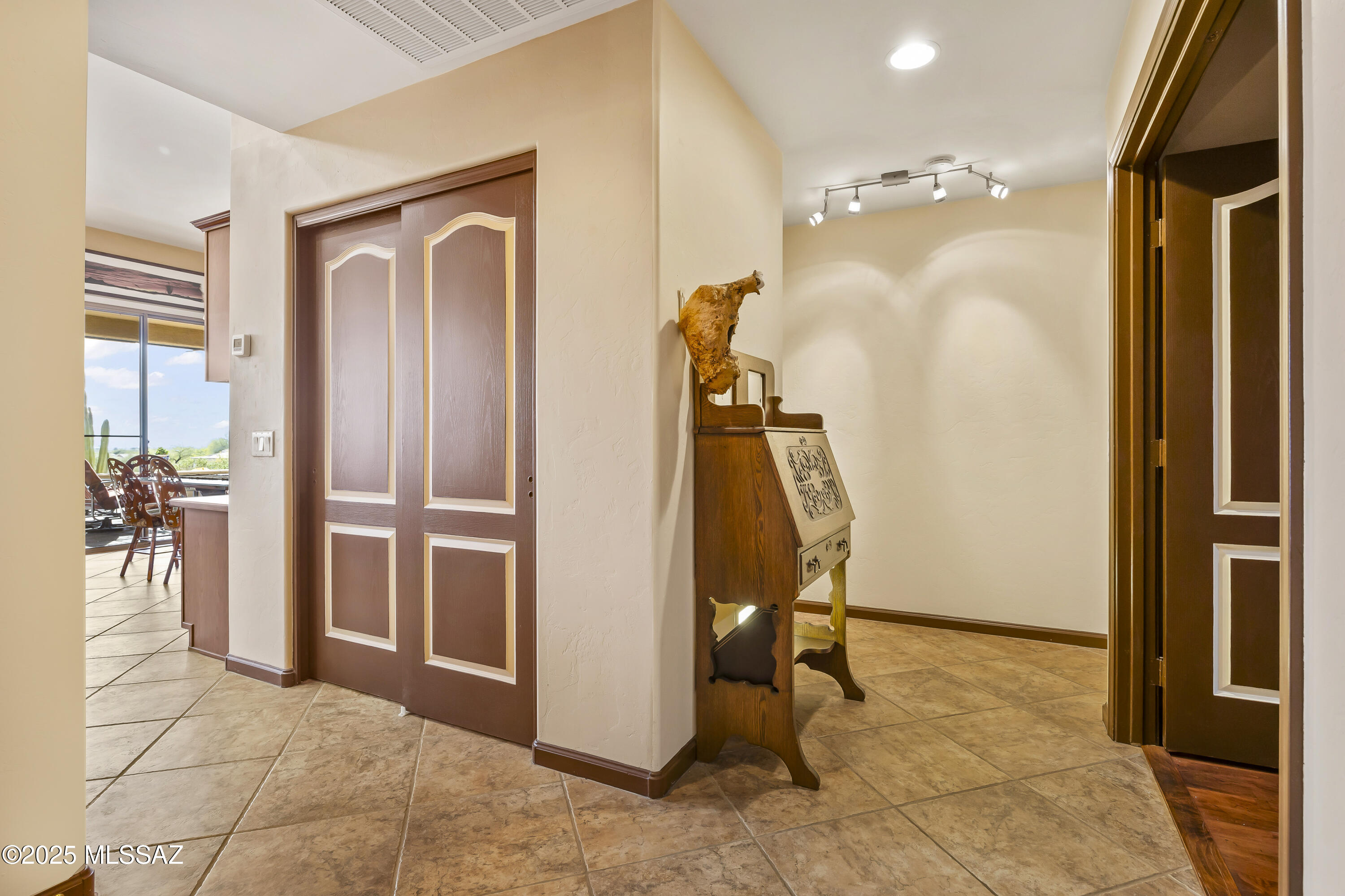 62893 East Flower Ridge Drive Tucson, AZ 85739 - Photo 15 of 49 Hallway to Den / Living Area / Primary Bed / Guest Bath