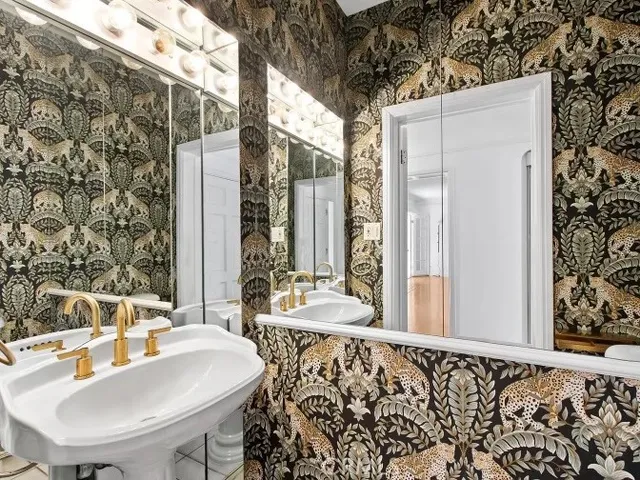 a outdoor space with patio the couch and chandelier