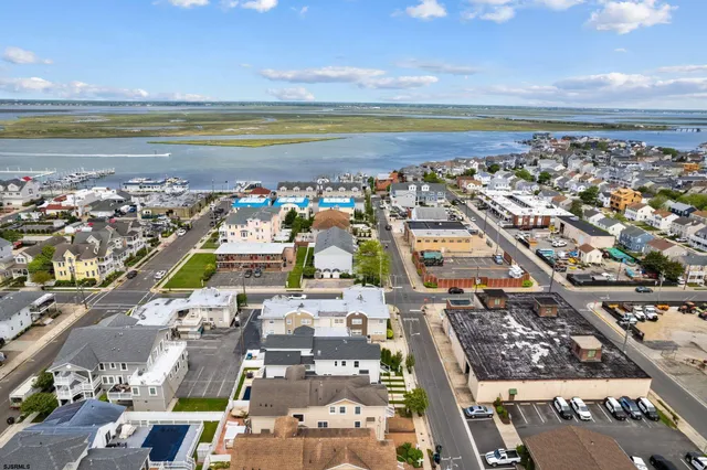 a view of city with ocean