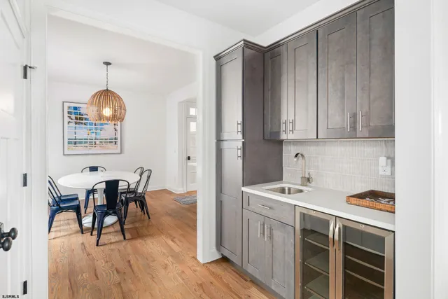 a view of a dining room and wooden floor