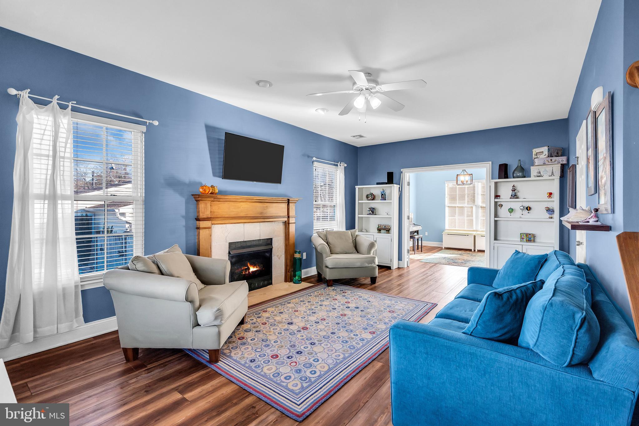 1007 Inland Road Forked River, NJ 08731 - Photo 3 of 27 a living room with furniture or couch and a fireplace