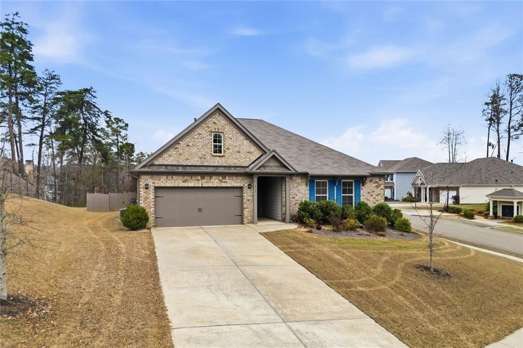 419 After Glow Summit Canton, GA 30114 - Photo 2 of 41 a front view of a house with yard