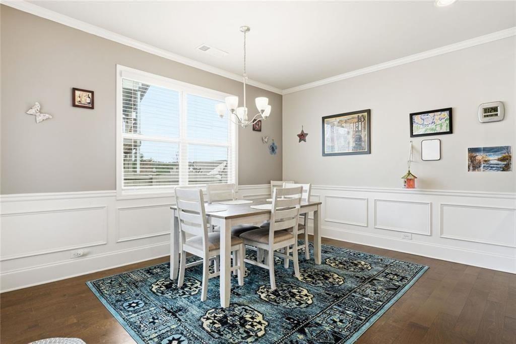 419 After Glow Summit Canton, GA 30114 - Photo 25 of 41 a view of a dining room with furniture and window