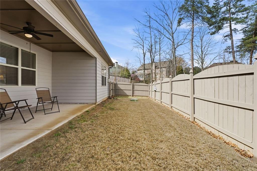 419 After Glow Summit Canton, GA 30114 - Photo 36 of 41 a view of backyard and wooden fence