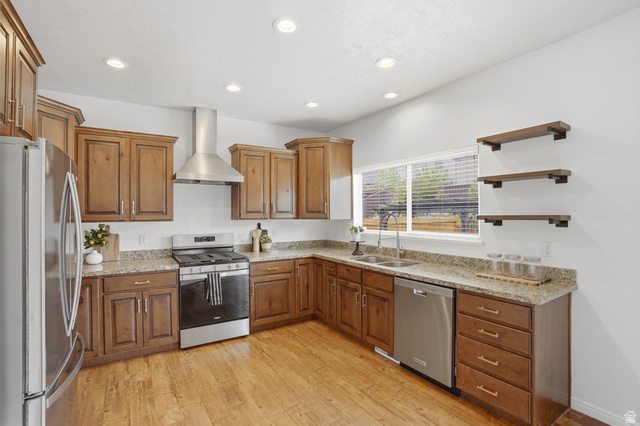 2007 Fielding Hill Lane Draper, UT 84020 - Photo 16 of 83 Kitchen featuring wood-finish flooring, recessed lighting, and a stainless steel appliance suite