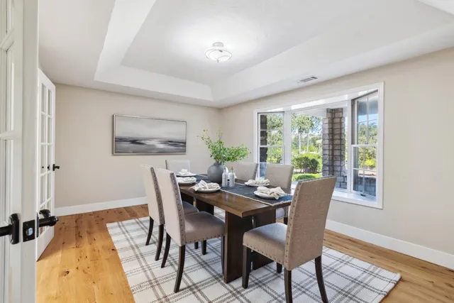 a kitchen with center island and stainless steel appliances