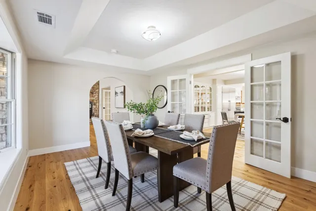 a kitchen with granite countertop a sink and stove