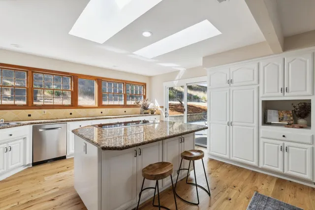 a bed room with a bed and a night stand