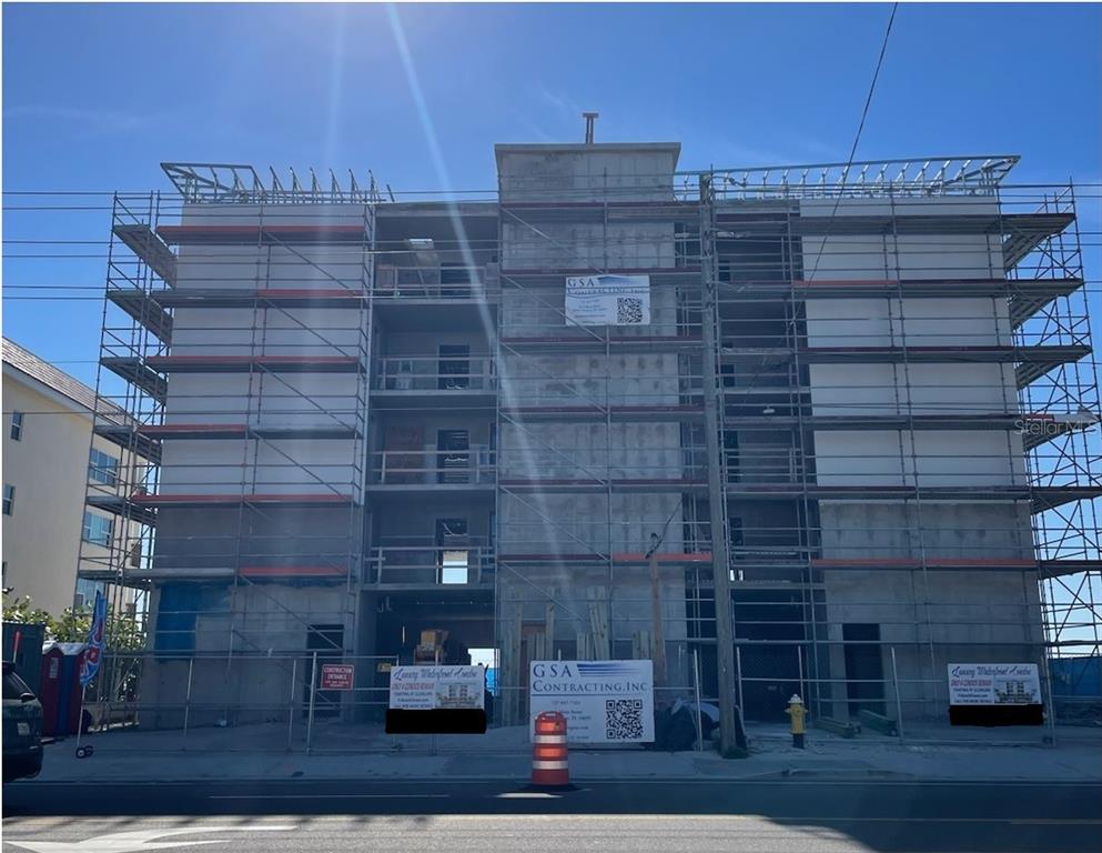 14048 Gulf Boulevard, Unit 401 Madeira Beach, FL 33708 - Photo 2 of 14 a view of a brick building