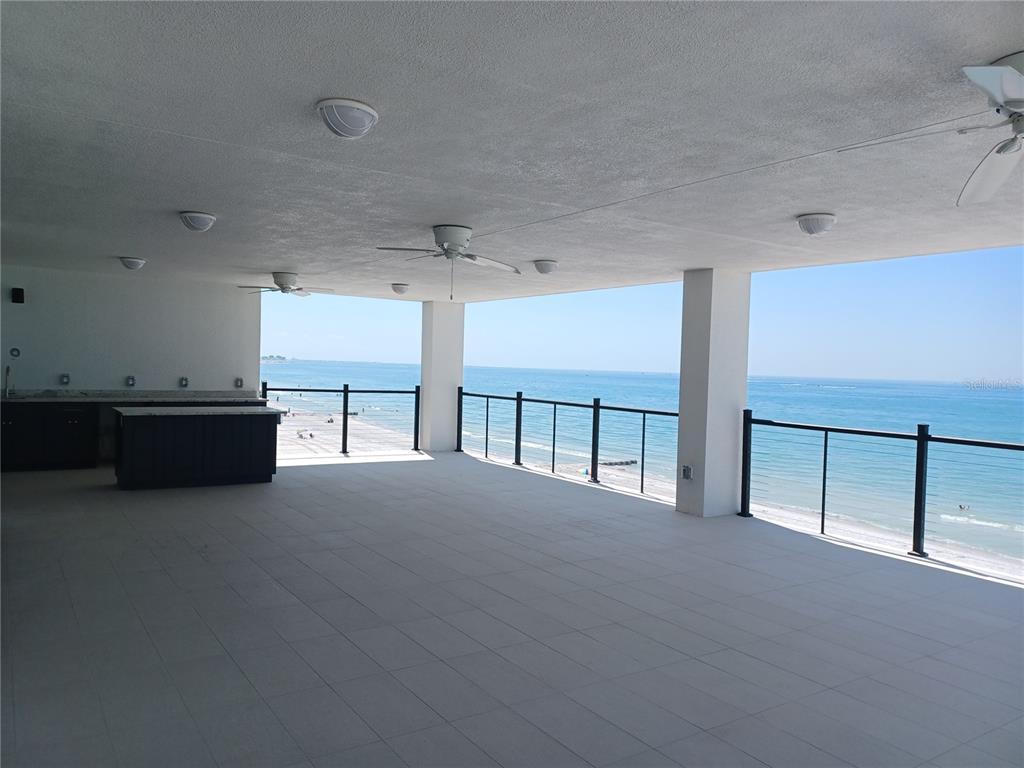 14048 Gulf Boulevard, Unit 401 Madeira Beach, FL 33708 - Photo 9 of 14 a view of an empty room with a window