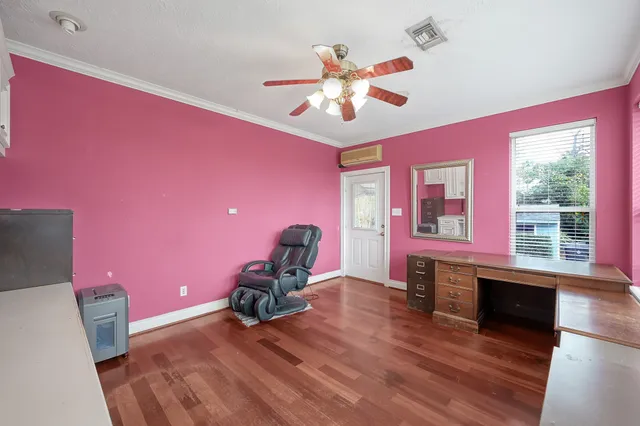 a spacious bathroom with a sink vanity and a mirror