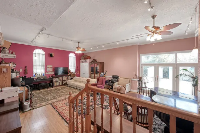a bathroom with a bathtub a shower and a sink