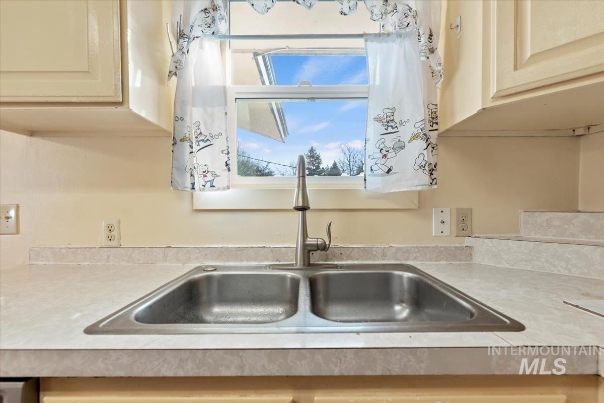 351 East 3rd Street Kuna, ID 83634 - Photo 9 of 42 Kitchen view of light countertops and a sink
