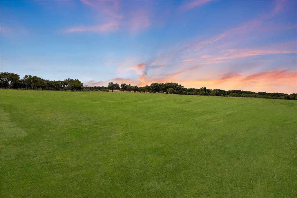 4870 Rhea Road Granbury, TX 76049 - Photo 18 of 35 Virtual twilight & grass greening enhancement