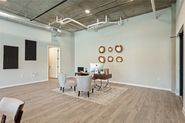 a living room with a wooden floor