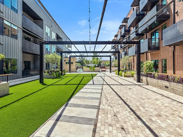 a view of swimming pool with a yard