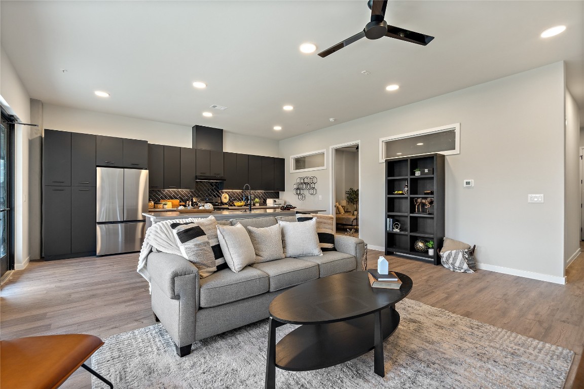 4510 Terry-O Lane, Unit 128 Austin, TX 78745 - Photo 24 of 29 a living room with furniture and a flat screen tv