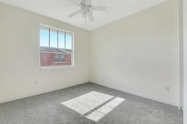 a bathroom with a sink a toilet a shower and a mirror