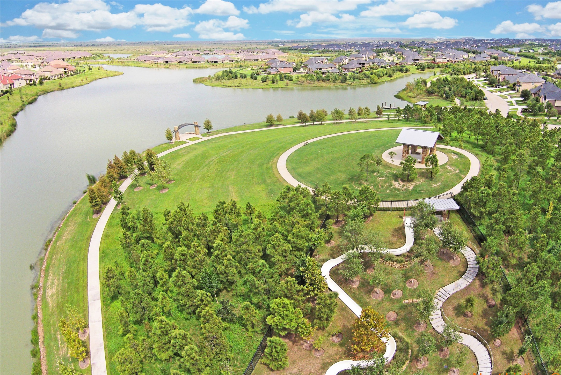 28211 Rippling Brook Lane Fulshear, TX 77441 - Photo 43 of 45 OUTDOOR LIFESTYLE: Over 45+ miles of scenic trails and 400+ acres of lakes create endless opportunities for walking, biking, and enjoying the outdoors.