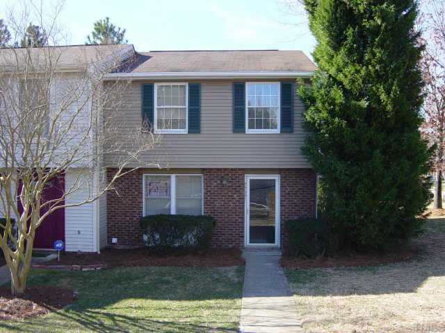 7737 Sandra Lane Raleigh, NC 27615 - Photo 1 of 1 a view of a house with a yard