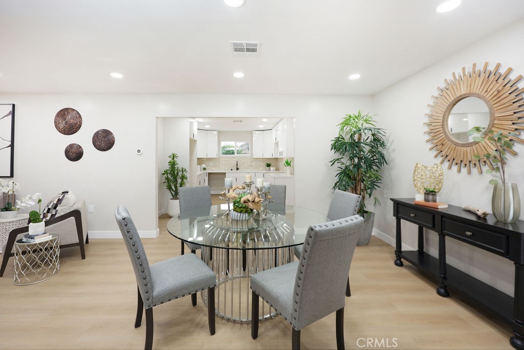 916 North West Street Anaheim, CA 92801 - Photo 11 of 27 a view of a dining room with furniture and wooden floor