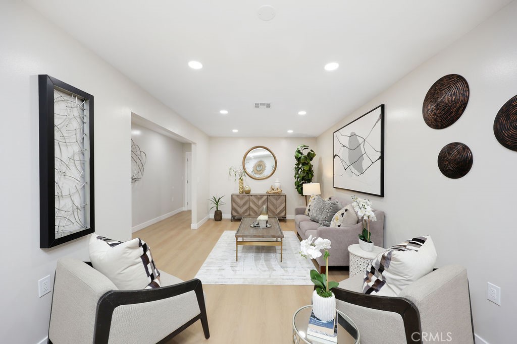 916 North West Street Anaheim, CA 92801 - Photo 12 of 27 a living room with furniture and a window